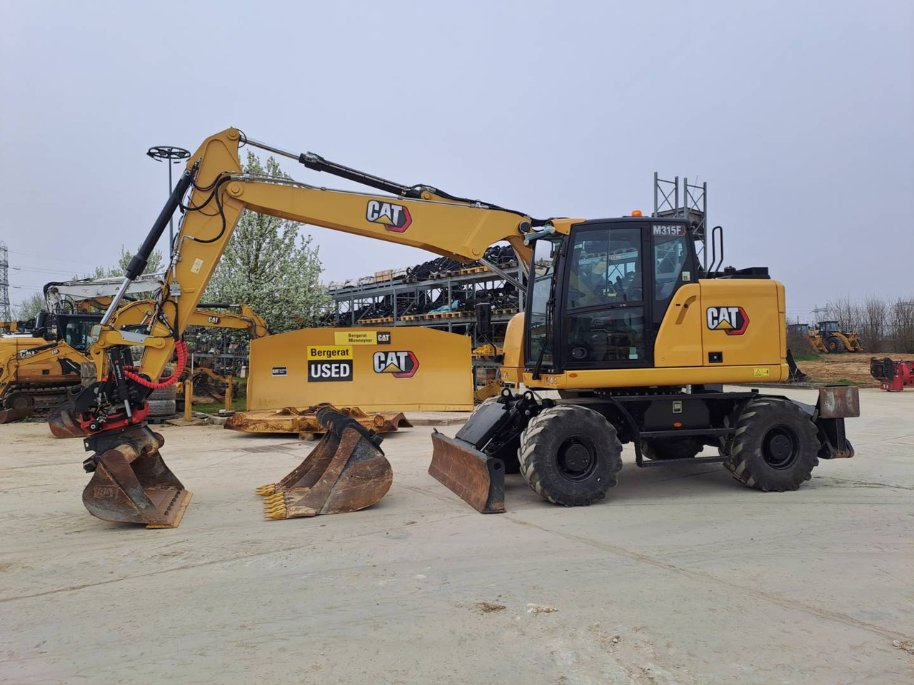 CAT M315F IVC - Bager na kotačima: slika CAT M315F IVC - Bager na kotačima CAT M315F IVC - Bager na kotačima: slika CAT M315F IVC - Bager na kotačima
