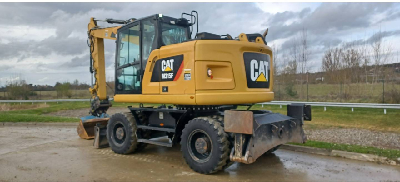 CAT M315F IVC - Bager na kotačima: slika CAT M315F IVC - Bager na kotačima CAT M315F IVC - Bager na kotačima: slika CAT M315F IVC - Bager na kotačima
