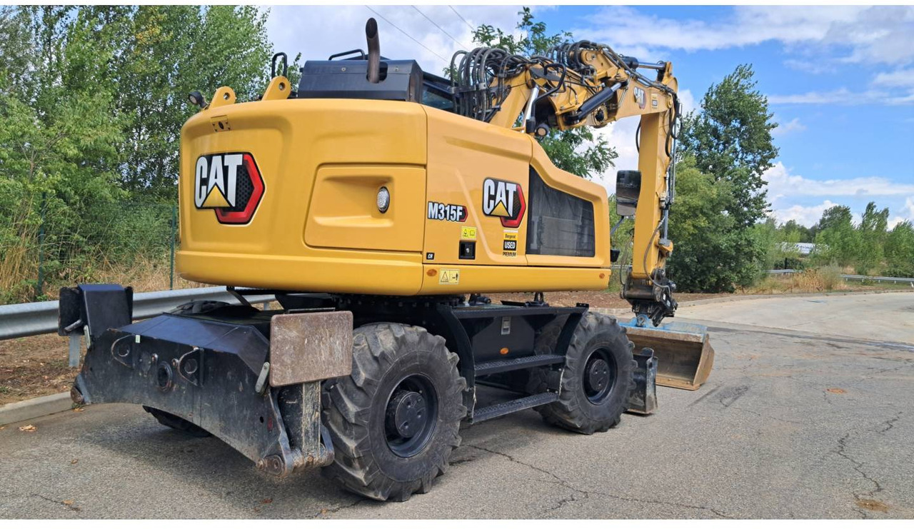 CAT M315F IVC - Bager na kotačima: slika CAT M315F IVC - Bager na kotačima CAT M315F IVC - Bager na kotačima: slika CAT M315F IVC - Bager na kotačima