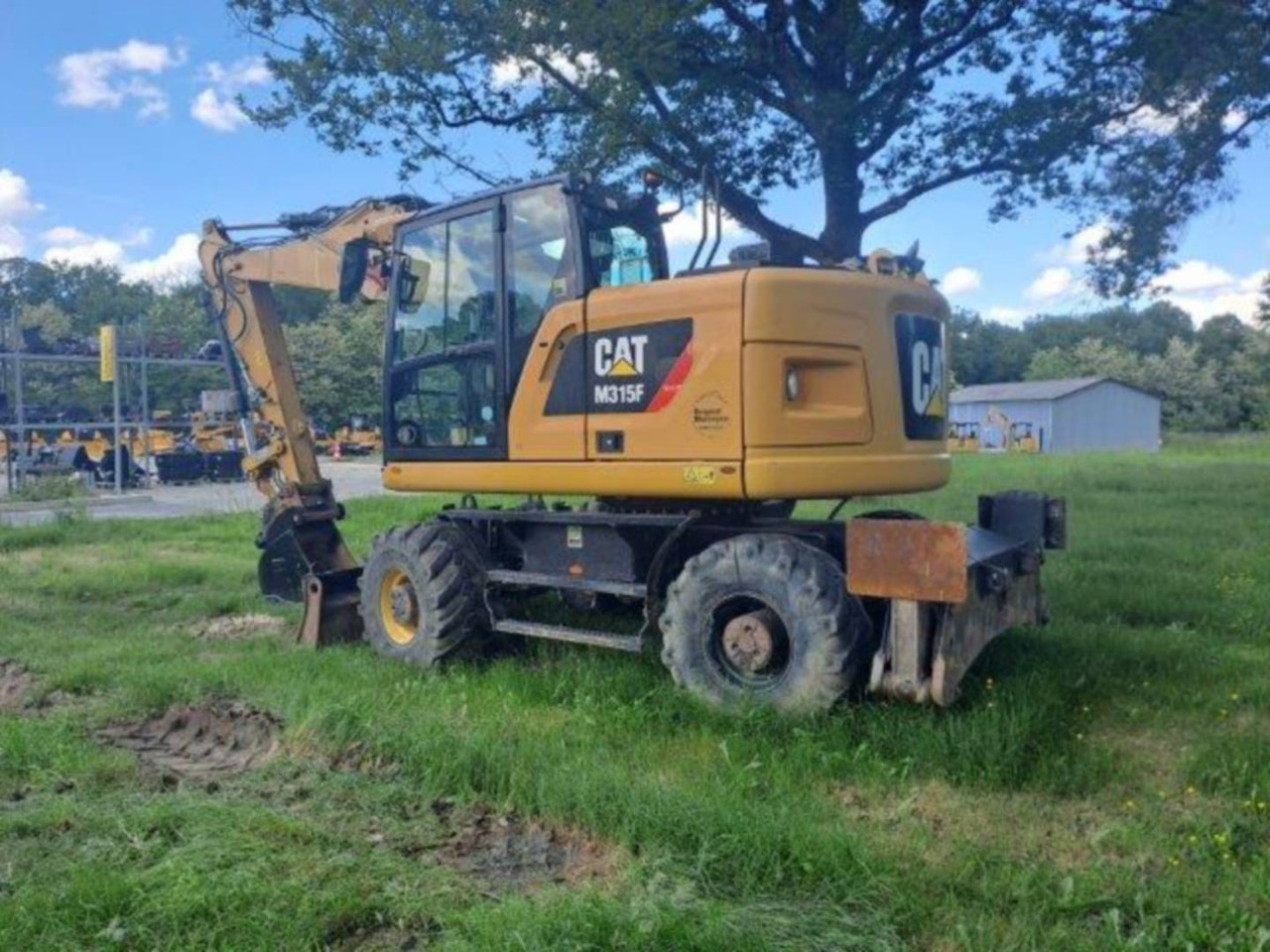 CAT M315F IVC - Bager na kotačima: slika CAT M315F IVC - Bager na kotačima CAT M315F IVC - Bager na kotačima: slika CAT M315F IVC - Bager na kotačima