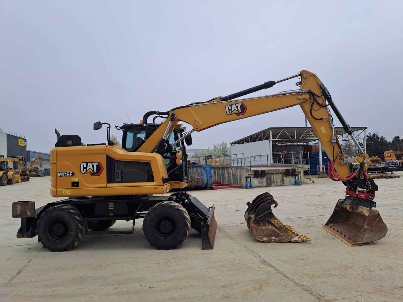 CAT M315F IVC - Bager na kotačima: slika CAT M315F IVC - Bager na kotačima CAT M315F IVC - Bager na kotačima: slika CAT M315F IVC - Bager na kotačima