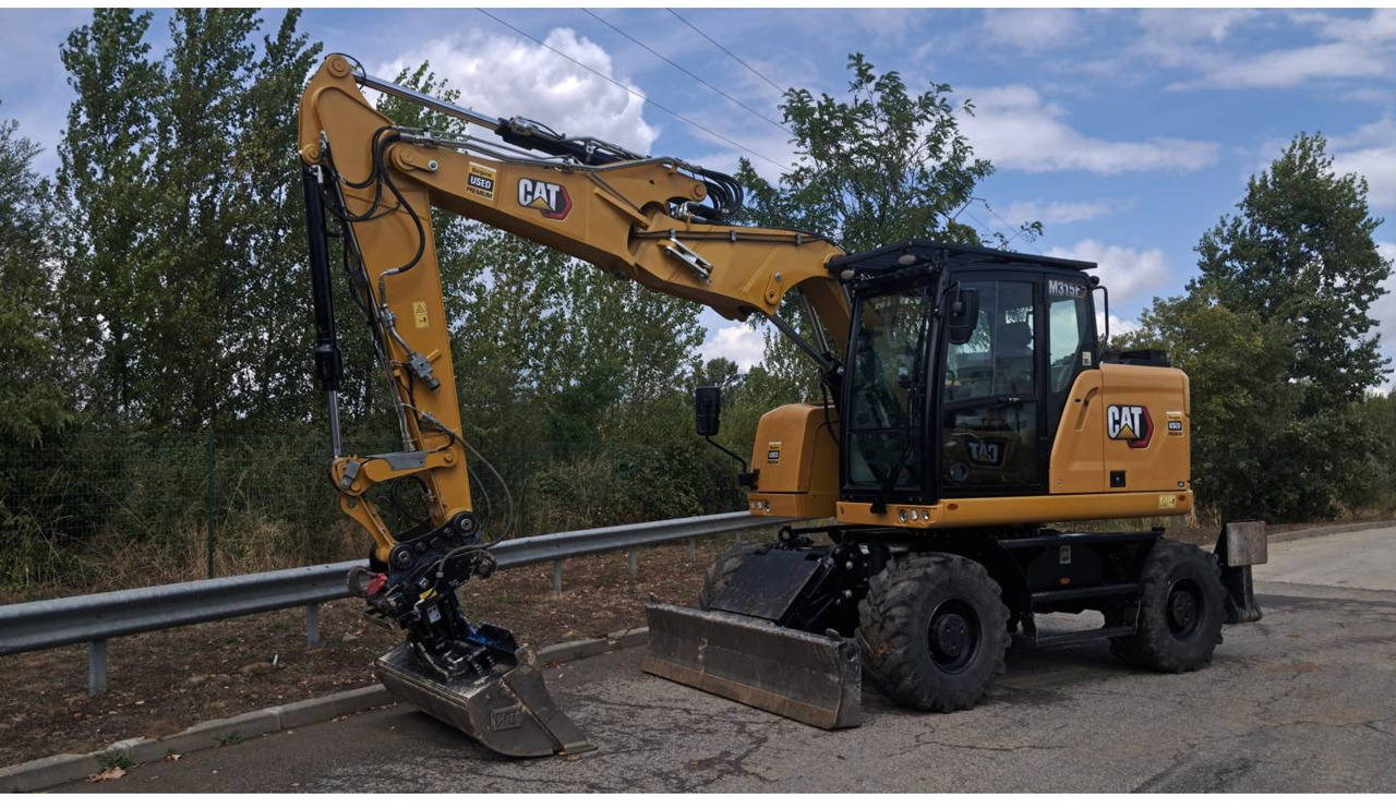 CAT M315F IVC - Bager na kotačima: slika CAT M315F IVC - Bager na kotačima CAT M315F IVC - Bager na kotačima: slika CAT M315F IVC - Bager na kotačima