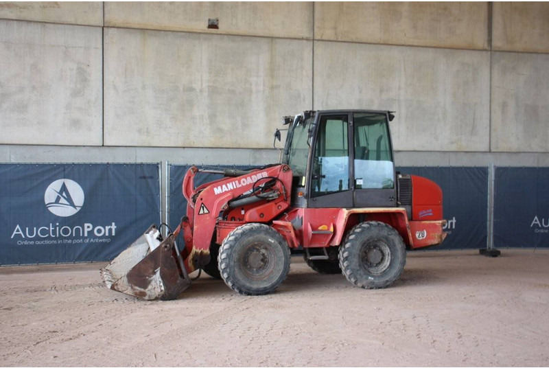 Ahlmann AS85/AS90 - Utovarivač na kotačima: slika Ahlmann AS85/AS90 - Utovarivač na kotačima Ahlmann AS85/AS90 - Utovarivač na kotačima: slika Ahlmann AS85/AS90 - Utovarivač na kotačima