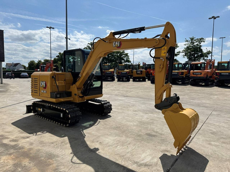 Caterpillar 305.5E2 - Bager gusjeničar: slika Caterpillar 305.5E2 - Bager gusjeničar Caterpillar 305.5E2 - Bager gusjeničar: slika Caterpillar 305.5E2 - Bager gusjeničar