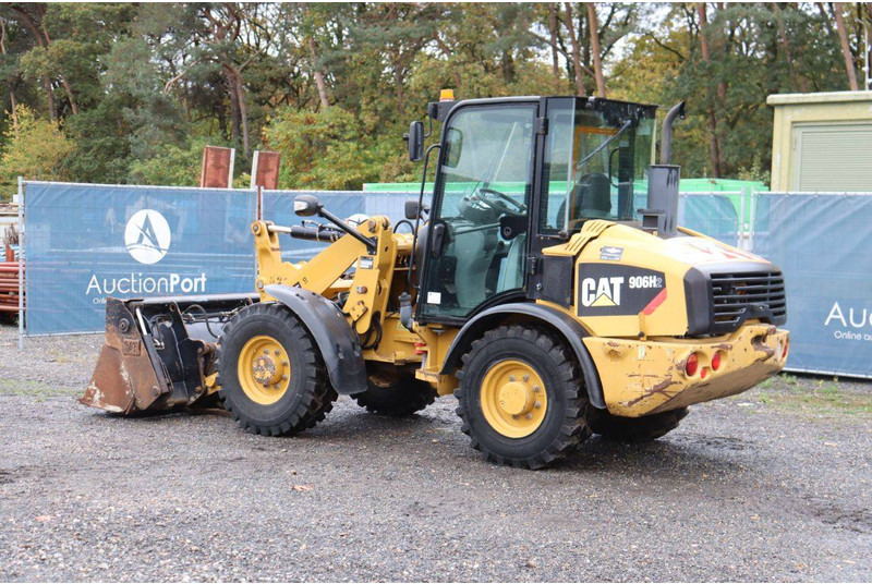 Caterpillar 906H2 - Utovarivač na kotačima: slika Caterpillar 906H2 - Utovarivač na kotačima Caterpillar 906H2 - Utovarivač na kotačima: slika Caterpillar 906H2 - Utovarivač na kotačima