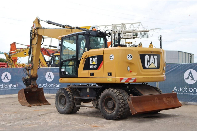 Caterpillar M314F - Bager na kotačima: slika Caterpillar M314F - Bager na kotačima Caterpillar M314F - Bager na kotačima: slika Caterpillar M314F - Bager na kotačima