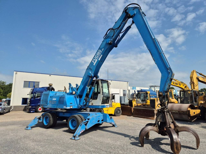 Fuchs MHL331 - Bager na kotačima: slika Fuchs MHL331 - Bager na kotačima Fuchs MHL331 - Bager na kotačima: slika Fuchs MHL331 - Bager na kotačima