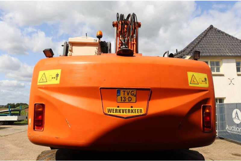 Hitachi ZX140W-3 - Bager na kotačima: slika Hitachi ZX140W-3 - Bager na kotačima Hitachi ZX140W-3 - Bager na kotačima: slika Hitachi ZX140W-3 - Bager na kotačima