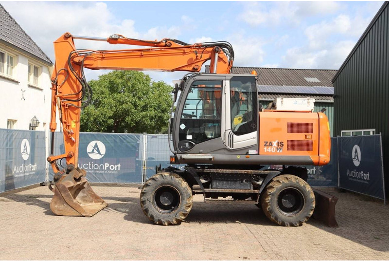 Hitachi ZX140W-3 - Bager na kotačima: slika Hitachi ZX140W-3 - Bager na kotačima Hitachi ZX140W-3 - Bager na kotačima: slika Hitachi ZX140W-3 - Bager na kotačima