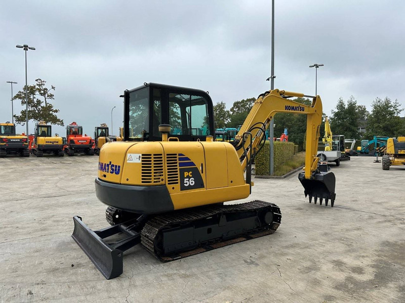 Komatsu PC56-7 - Bager gusjeničar: slika Komatsu PC56-7 - Bager gusjeničar Komatsu PC56-7 - Bager gusjeničar: slika Komatsu PC56-7 - Bager gusjeničar