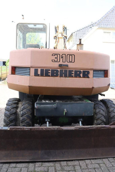 Liebherr A 310 - Bager na kotačima: slika Liebherr A 310 - Bager na kotačima Liebherr A 310 - Bager na kotačima: slika Liebherr A 310 - Bager na kotačima