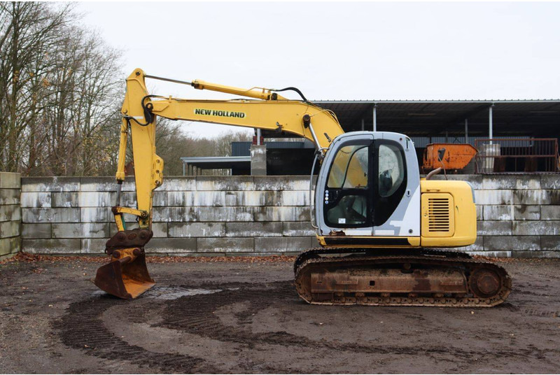 New Holland E115SR - Bager gusjeničar: slika New Holland E115SR - Bager gusjeničar New Holland E115SR - Bager gusjeničar: slika New Holland E115SR - Bager gusjeničar