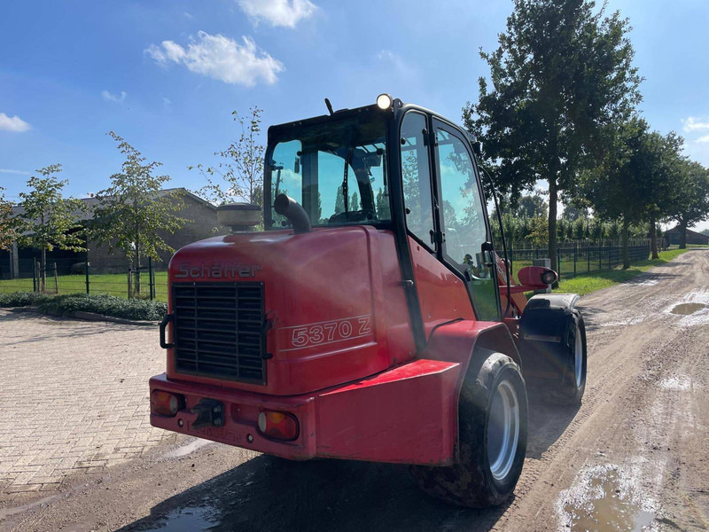 Schäffer 5370 - Utovarivač na kotačima: slika Schäffer 5370 - Utovarivač na kotačima Schäffer 5370 - Utovarivač na kotačima: slika Schäffer 5370 - Utovarivač na kotačima