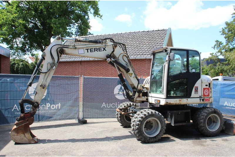 Terex TW85 - Bager na kotačima: slika Terex TW85 - Bager na kotačima Terex TW85 - Bager na kotačima: slika Terex TW85 - Bager na kotačima