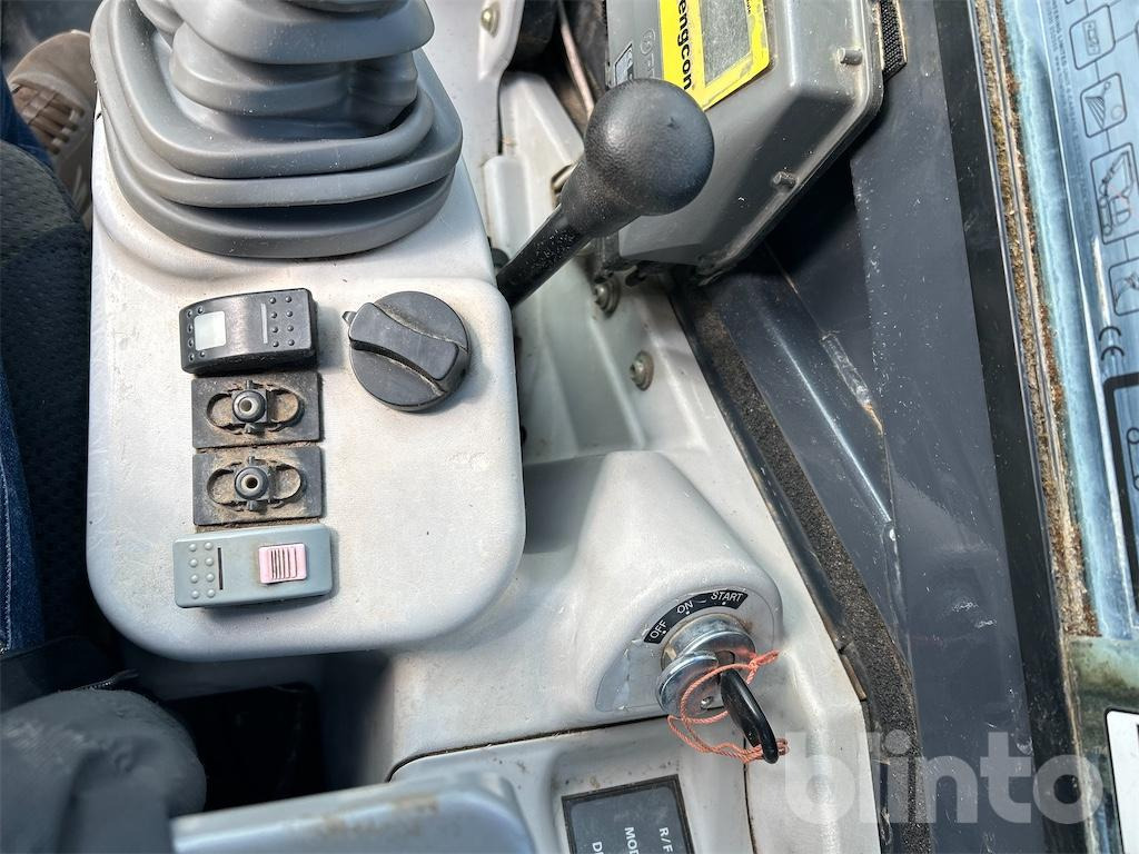 Bager gusjeničar Hitachi: slika Bager gusjeničar Hitachi