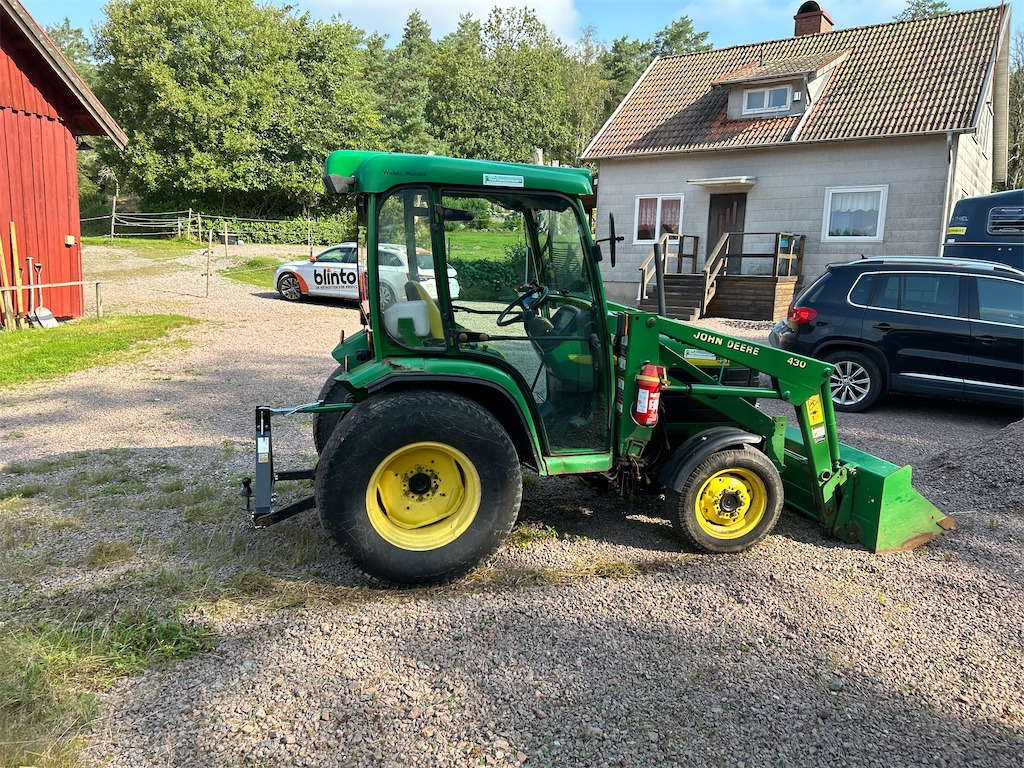 JOHN DEERE 4410 med lastare och skopa - Mali traktor: slika JOHN DEERE 4410 med lastare och skopa - Mali traktor JOHN DEERE 4410 med lastare och skopa - Mali traktor: slika JOHN DEERE 4410 med lastare och skopa - Mali traktor