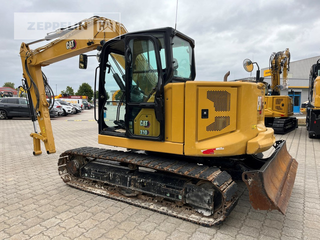 Cat 310 - Mini bager: slika Cat 310 - Mini bager Cat 310 - Mini bager: slika Cat 310 - Mini bager