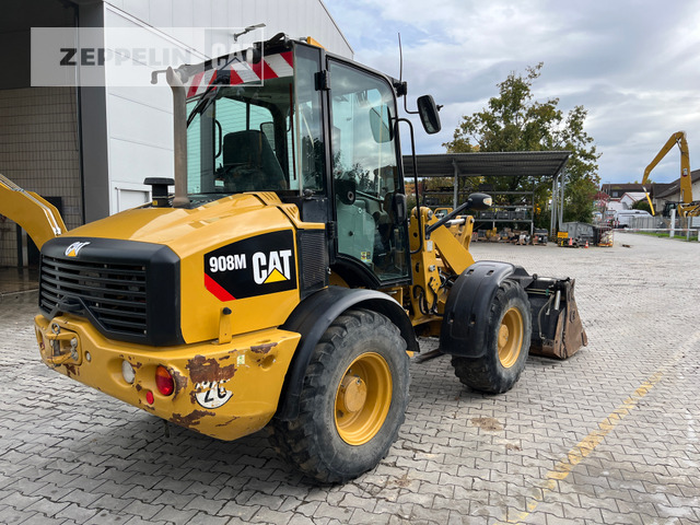 Cat 908M - Utovarivač na kotačima: slika Cat 908M - Utovarivač na kotačima Cat 908M - Utovarivač na kotačima: slika Cat 908M - Utovarivač na kotačima