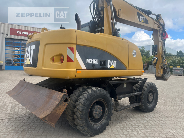 Cat M315D - Bager na kotačima: slika Cat M315D - Bager na kotačima Cat M315D - Bager na kotačima: slika Cat M315D - Bager na kotačima