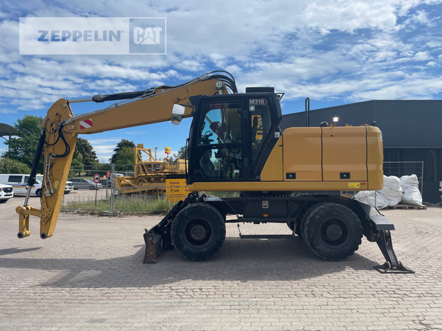 Cat M316-07A - Bager na kotačima: slika Cat M316-07A - Bager na kotačima Cat M316-07A - Bager na kotačima: slika Cat M316-07A - Bager na kotačima