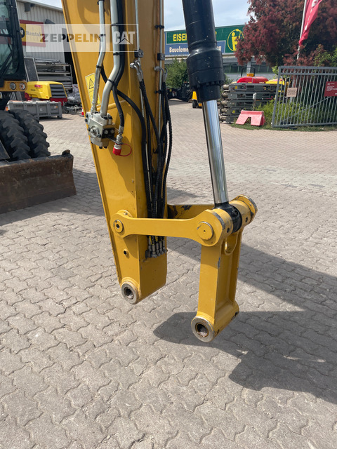 Bager na kotačima Cat M316-07A: slika Bager na kotačima Cat M316-07A