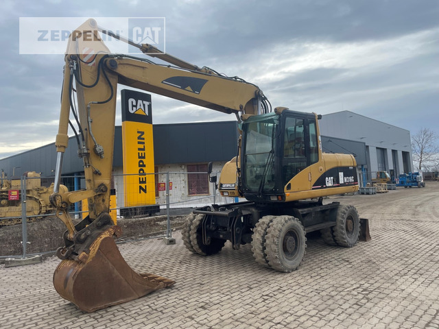 Cat M316C - Bager na kotačima: slika Cat M316C - Bager na kotačima Cat M316C - Bager na kotačima: slika Cat M316C - Bager na kotačima