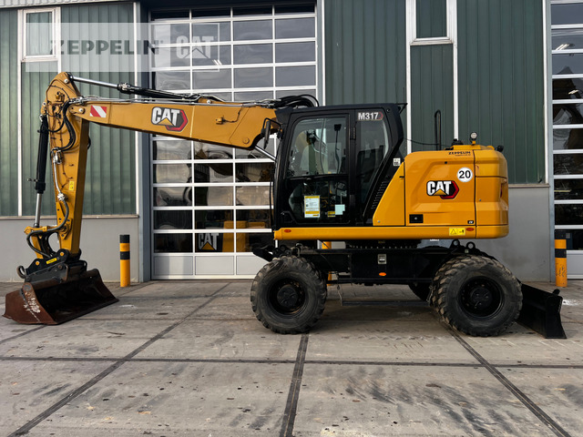 Cat M317-07A - Bager na kotačima: slika Cat M317-07A - Bager na kotačima Cat M317-07A - Bager na kotačima: slika Cat M317-07A - Bager na kotačima