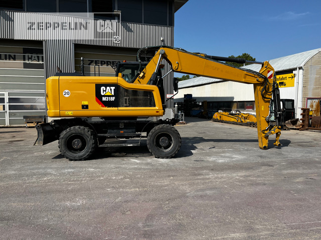 Cat M318F - Bager na kotačima: slika Cat M318F - Bager na kotačima Cat M318F - Bager na kotačima: slika Cat M318F - Bager na kotačima