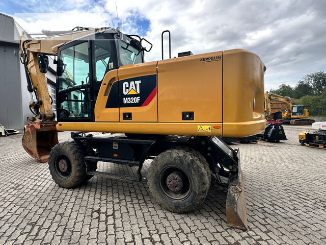 Cat M320F - Bager na kotačima: slika Cat M320F - Bager na kotačima Cat M320F - Bager na kotačima: slika Cat M320F - Bager na kotačima