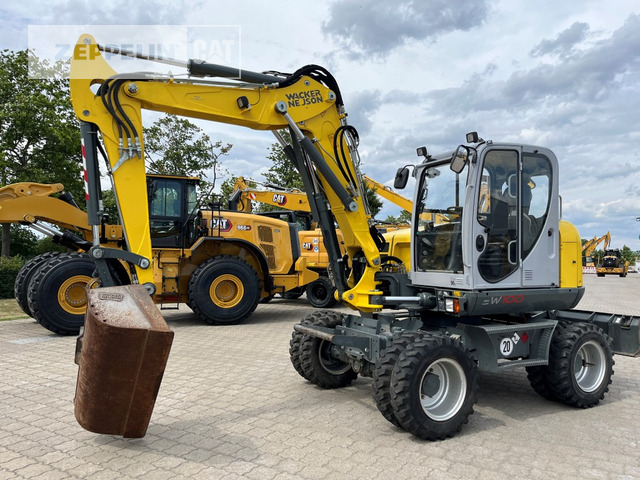Wacker EW100 - Bager na kotačima: slika Wacker EW100 - Bager na kotačima Wacker EW100 - Bager na kotačima: slika Wacker EW100 - Bager na kotačima