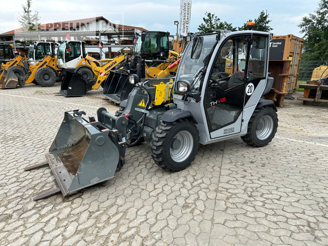Wacker TH412 - Teleskopski rukovatelj: slika Wacker TH412 - Teleskopski rukovatelj Wacker TH412 - Teleskopski rukovatelj: slika Wacker TH412 - Teleskopski rukovatelj