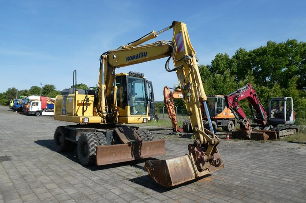 KOMATSU HANOMAG Mobilbagger PW140-7 Mobilbagger - Bager na kotačima: slika KOMATSU HANOMAG Mobilbagger PW140-7 Mobilbagger - Bager na kotačima KOMATSU HANOMAG Mobilbagger PW140-7 Mobilbagger - Bager na kotačima: slika KOMATSU HANOMAG Mobilbagger PW140-7 Mobilbagger - Bager na kotačima