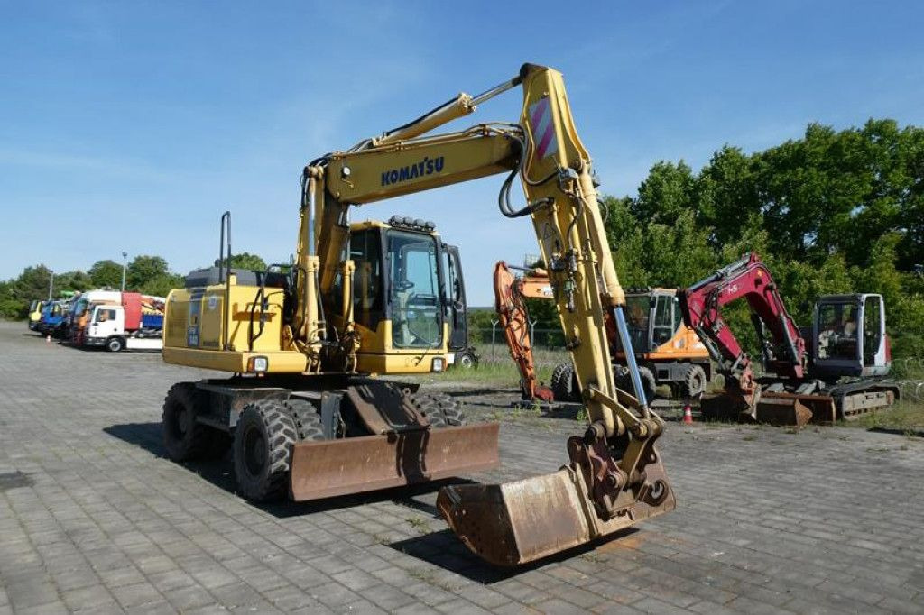 Komatsu Mobilbagger PW140-7 Mobilbagger - Bager na kotačima: slika Komatsu Mobilbagger PW140-7 Mobilbagger - Bager na kotačima Komatsu Mobilbagger PW140-7 Mobilbagger - Bager na kotačima: slika Komatsu Mobilbagger PW140-7 Mobilbagger - Bager na kotačima