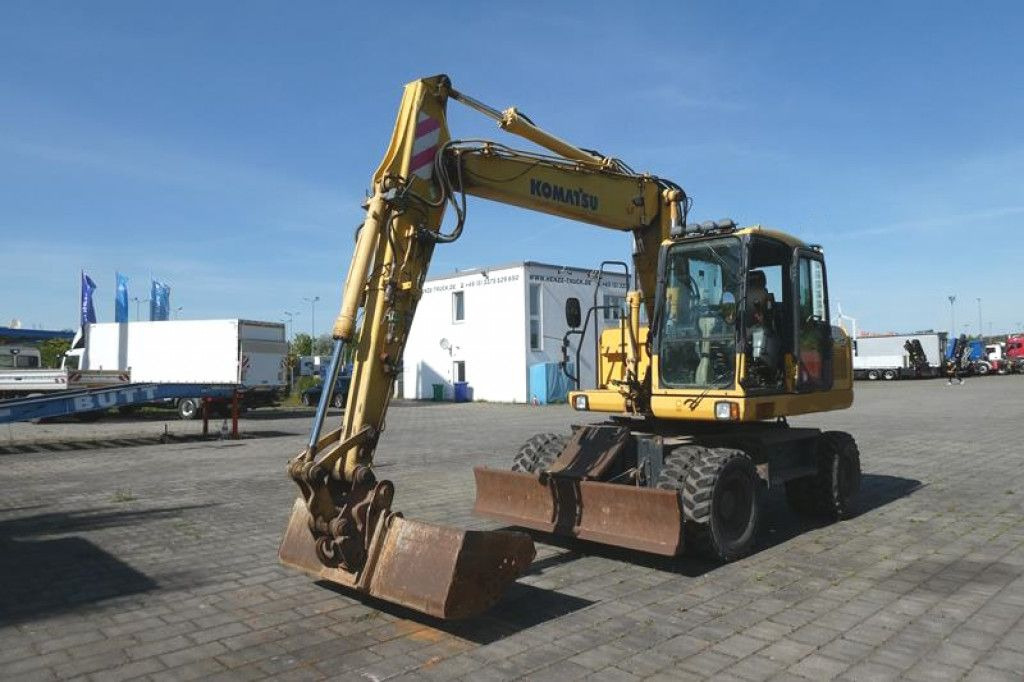 Komatsu Mobilbagger PW140-7 Mobilbagger - Bager na kotačima: slika Komatsu Mobilbagger PW140-7 Mobilbagger - Bager na kotačima Komatsu Mobilbagger PW140-7 Mobilbagger - Bager na kotačima: slika Komatsu Mobilbagger PW140-7 Mobilbagger - Bager na kotačima