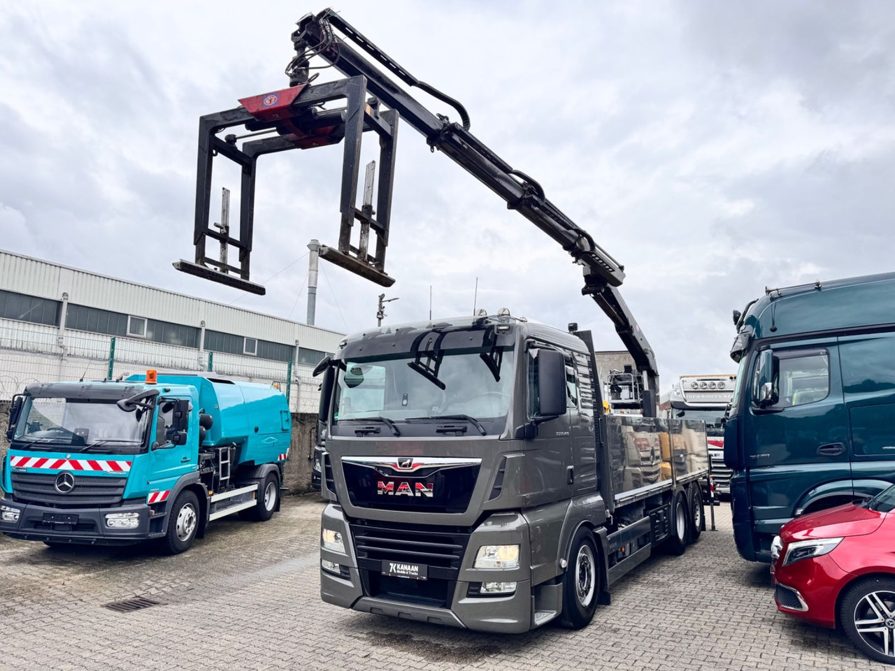 MAN 26.460 TGX Baustoffkran HMF 2110-L3 - Kamion s kranom: slika MAN 26.460 TGX Baustoffkran HMF 2110-L3 - Kamion s kranom MAN 26.460 TGX Baustoffkran HMF 2110-L3 - Kamion s kranom: slika MAN 26.460 TGX Baustoffkran HMF 2110-L3 - Kamion s kranom