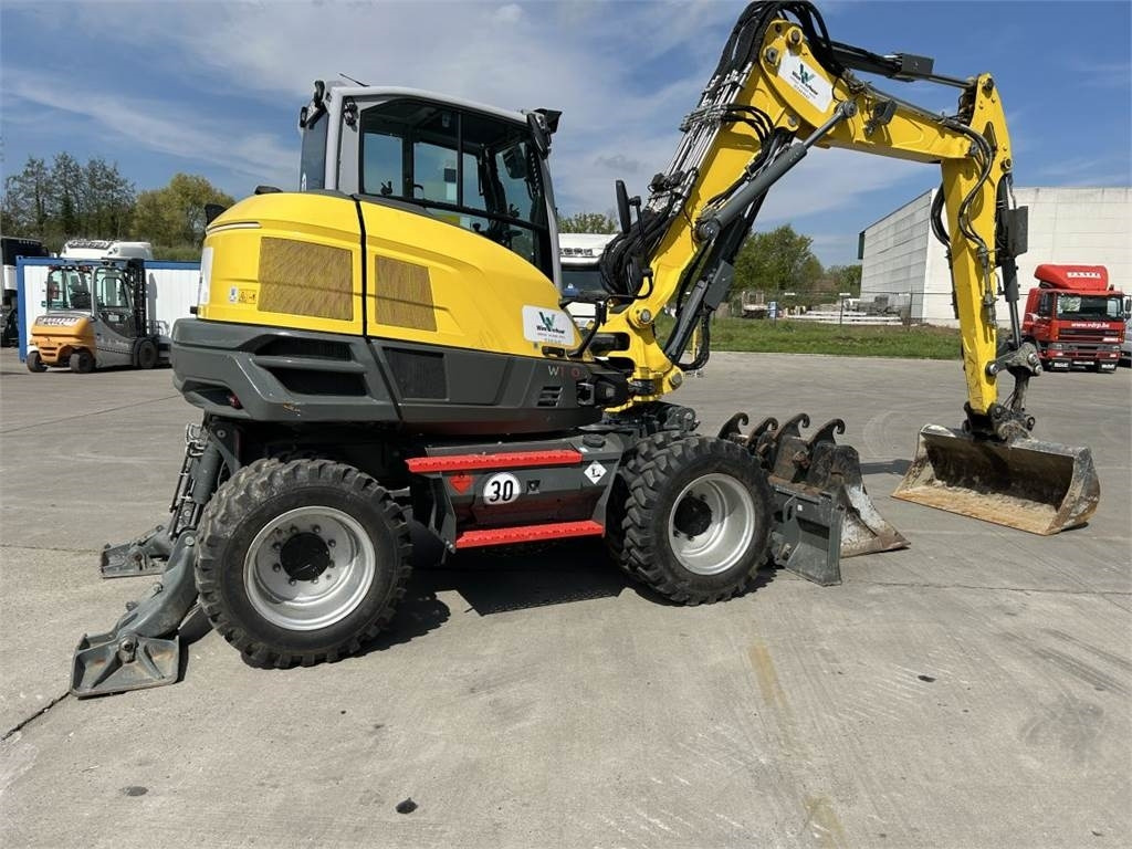 Neuson Wacker Neuson EW100 (9020) - Bager na kotačima: slika Neuson Wacker Neuson EW100 (9020) - Bager na kotačima Neuson Wacker Neuson EW100 (9020) - Bager na kotačima: slika Neuson Wacker Neuson EW100 (9020) - Bager na kotačima