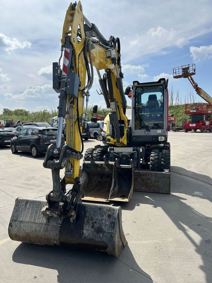 Neuson Wacker Neuson EW100 (9020) - Bager na kotačima: slika Neuson Wacker Neuson EW100 (9020) - Bager na kotačima Neuson Wacker Neuson EW100 (9020) - Bager na kotačima: slika Neuson Wacker Neuson EW100 (9020) - Bager na kotačima