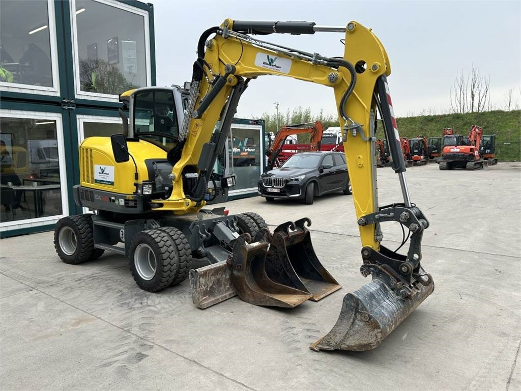 Neuson Wacker Neuson EW65 (8946) - Bager na kotačima: slika Neuson Wacker Neuson EW65 (8946) - Bager na kotačima Neuson Wacker Neuson EW65 (8946) - Bager na kotačima: slika Neuson Wacker Neuson EW65 (8946) - Bager na kotačima